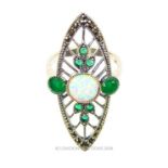 An Art Deco -style silver ring set with emeralds and opalites