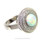 A silver, Art Deco-style ring set with white crystals and opalite
