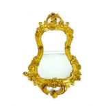 A 19th century Giltwood and Gesso Kidney shaped Mirror.