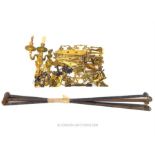 A collection of antique, French, gilt-metal, door furniture and curtain poles