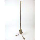 A late 19th century gilt brass standard lamp