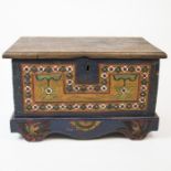 A carved and painted Indonesian trunk