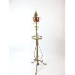 An Art Nouveau brass telescopic standard lamp