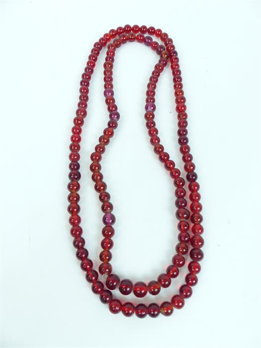 Two red glass beaded necklaces
