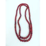 Two red glass beaded necklaces