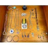 A collection of sterling silver jewellery items and 'Africa' medal