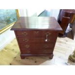 A Georgian style hardwood chest of four long drawers