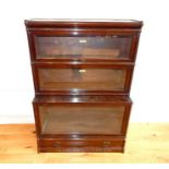 A Globe Wernicke oak three-tier bookcase