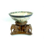 Chinese Bowl on a Wooden Elephant Stand