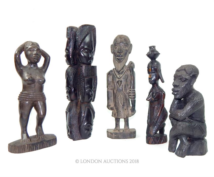 A Collection of Five West African Carved Figures