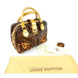 An authentic, Louis Vuitton, medium, ladies handbag