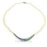 A white gold, cultured pearl necklace with bejewelled pendant