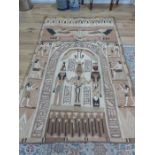 A large wall hanging depicting Ancient Egyptian gods