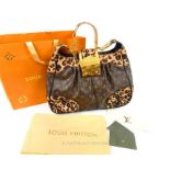 An authentic, Louis Vuitton, large, ladies handbag