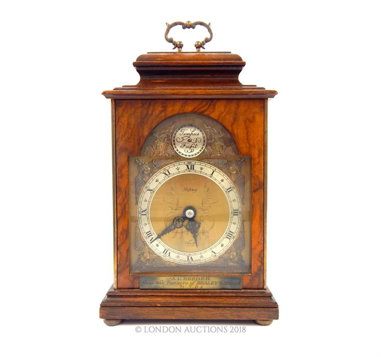 A walnut-cased, Asprey, clock