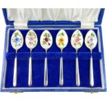 A cased set of six enamelled sterling silver spoons