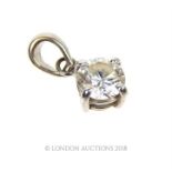 An 18 ct white gold, diamond solitaire, pendant