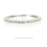An 18 ct white gold and diamond, eternity ring