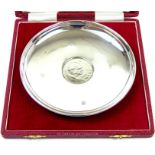 A sterling silver dish set with a 1965 Winston Churchill coin