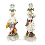 A pair of 19th century, German, hand-painted porcelain candlesticks