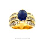 An 18 ct yellow gold, diamond and sapphire ring