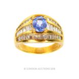 An 18 ct yellow gold, diamond and tanzanite ring