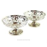 A pair of sterling silver sweetmeat dishes
