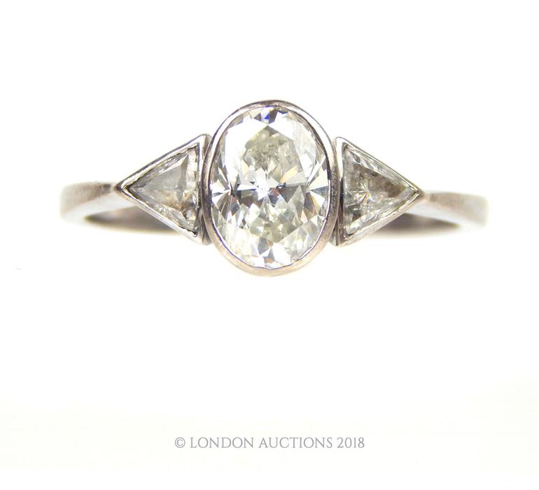 An 18 ct white gold, oval-shaped diamond ring - Image 3 of 3