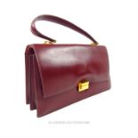 A vintage, Hermes, maroon-leather handbag