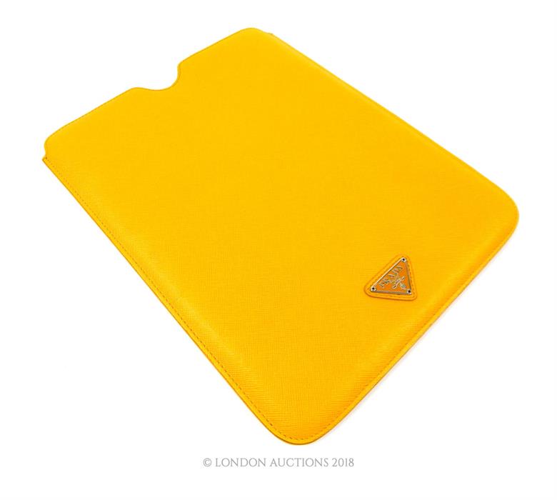 A Prada, mustard-yellow, leather Ipad case/cover