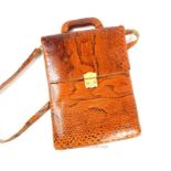 A vintage, Estee Lauder, brown python skin, messenger bag