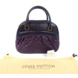 A Louis Vuitton, Mitzi bag