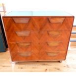 An Art Deco, walnut, chest of drawers with frosted glass top