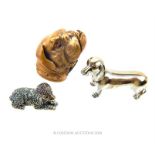 Three dog-related items (two of which being silver)