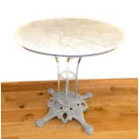 Marble top, circular table with grey, painted cast iron base