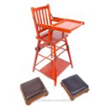 A vintage, red painted, child's high-chair with a pair of Victorian footstools