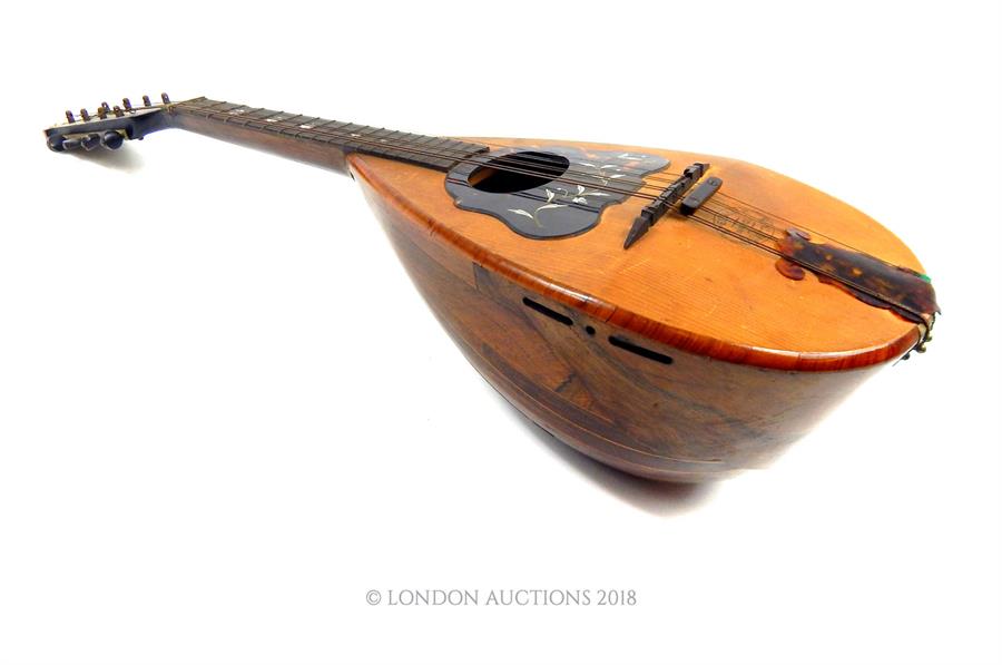 A 19th century, cased, mandolin in walnut and box-wood - Image 3 of 4
