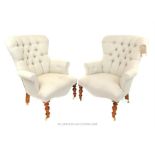 A pair of contemporary Victorian style button back linen upholstered armchairs