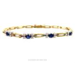 A 14 ct yellow gold, sapphire and diamond bracelet