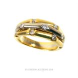 An 18 ct yellow and white gold and diamond ring