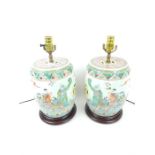 A pair of Chinese barrel shaped porcelain table lamps