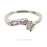 An 18 ct white gold, marquise and brilliant cut diamond ring