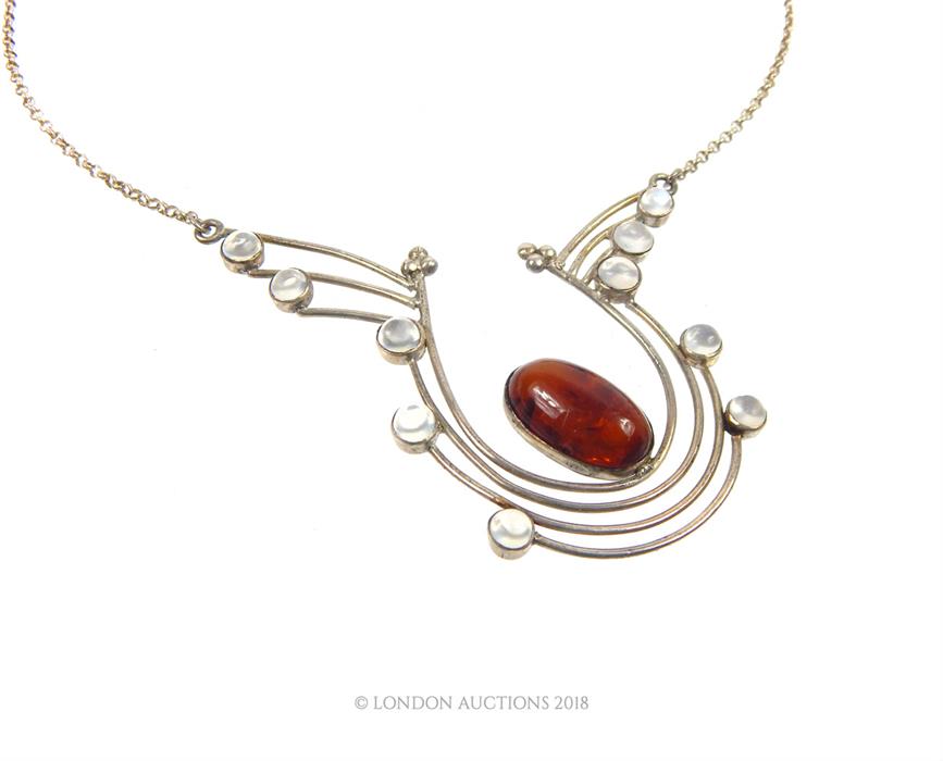 A sterling silver, amber and moonstone necklace