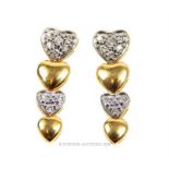 pair of of 14ct yellow gold graduated hearts diamond set earrings