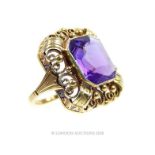 An antique, 14 ct yellow gold, filigree mounted, amethyst ring