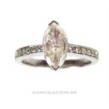 An 18 ct white gold, marquise and brilliant cut diamond ring (totalling 1.5 carats)