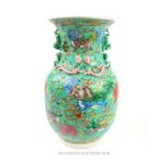 A Chinese porcelain turquoise famille rose vase