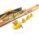 Vintage, tin plated toys to include a line of ducks by Schuco