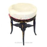 Ebonised piano stool with gilded decoration