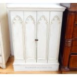 Gothic style painted pine cabinet
